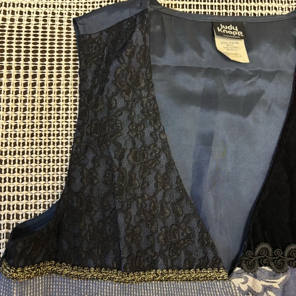 Judy Knapp Vintage vest in various shades of blue by with a printed design SizeS